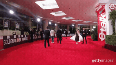 Woman In White Dress On Red Carpet Golden Globe Awards GIF