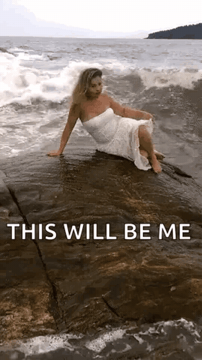 Woman In White Dress On Rock Saying This Will Be Me GIF