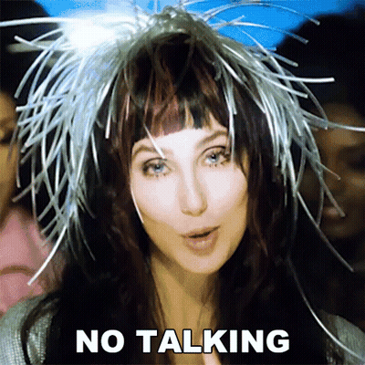 Woman In White Dress On Stage Before TV GIF