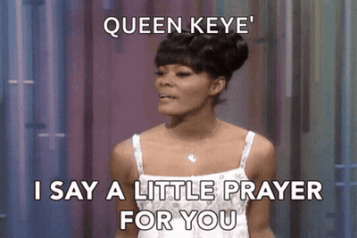 Woman In White Dress Saying Little Prayer GIF