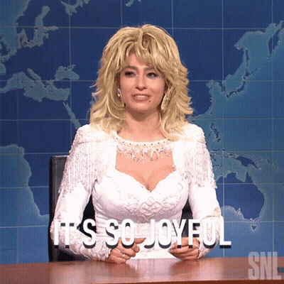 Woman In White Dress Says It's So Joyful On SNL GIF