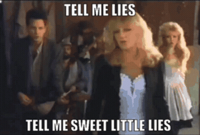 Woman In White Dress Says Tell Me Lies Tell Me Sweet Little Lies GIF