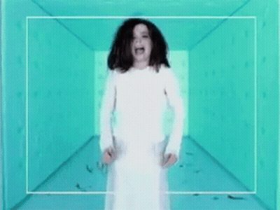 Woman In White Dress Screaming In Blue Hallway GIF