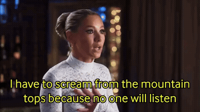 Woman In White Dress Screaming On Mountain Top GIF