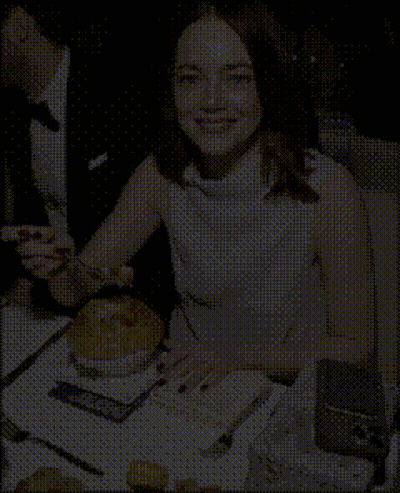 Woman In White Dress Sitting At Table With Plate Of Food GIF