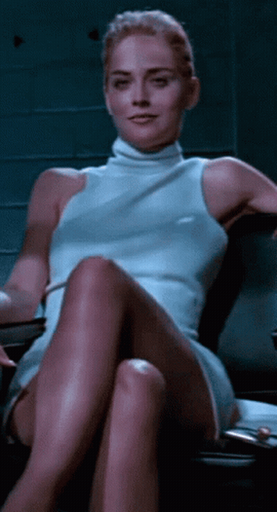 Woman In White Dress Sitting In Chair GIF