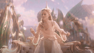 Woman In White Dress Sitting On Throne GIF