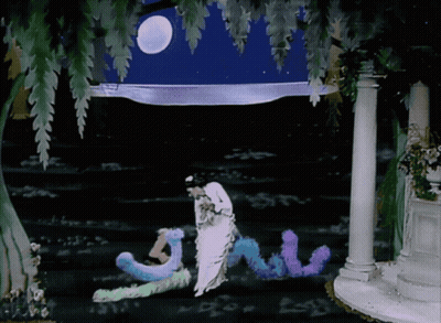 Woman In White Dress Standing Before NV Sign GIF