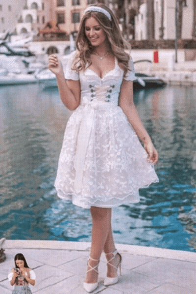 Woman In White Dress Standing By Water GIF