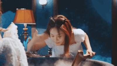 Woman In White Dress Standing In Bathtub Looking In Mirror GIF
