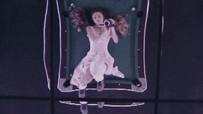 Woman In White Dress Taking Selfie GIF