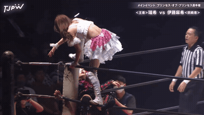 Woman In White Dress Thrown Into Wrestling Ring By Referee GIF