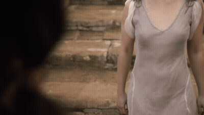 Woman In White Dress Walking Down Stone Steps GIF
