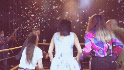 Woman In White Dress Watching Confetti Fall GIF
