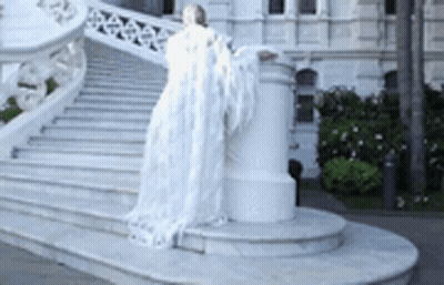 Woman In White Dress With Angel Wings GIF