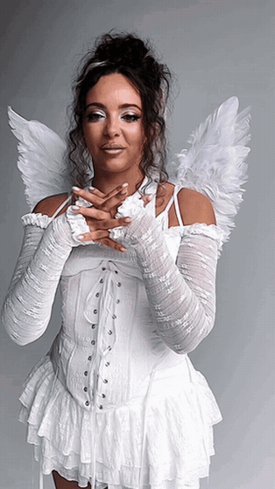 Woman in White Dress with Angel Wings