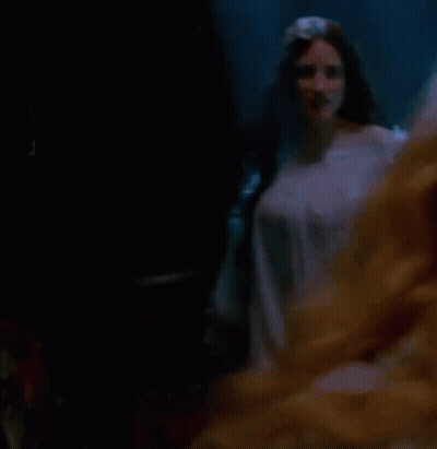 Woman In White Dress With Long Sleeves Dancing GIF