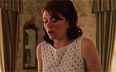 Woman In White Dress With Pink Polka Dots GIF
