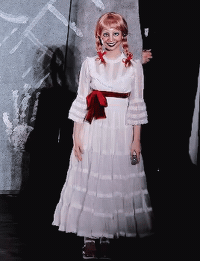 Woman In White Dress With Red Bow GIF