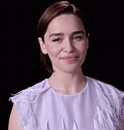 Woman In White Feathered Top Smiling GIF