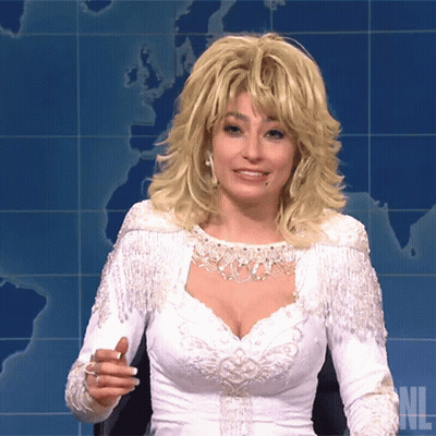 Woman In White Fringe Dress On SNL GIF