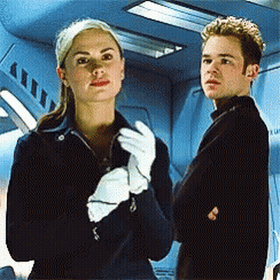 Woman In White Gloves Next To Man GIF
