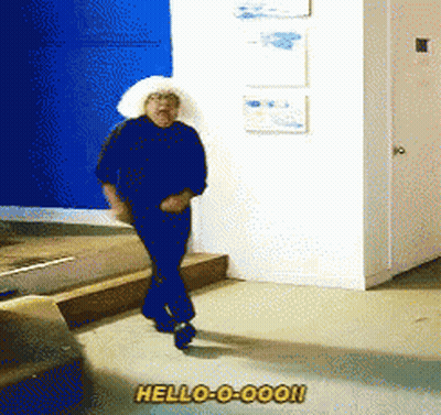 Woman In White Hat Saying Hello-O-Oooh GIF