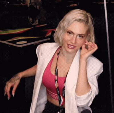 Woman in White Jacket and Pink Calvin Klein Bra
