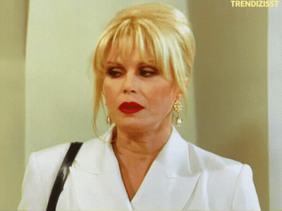 Woman In White Jacket Red Lipstick Saying Trendizisst GIF