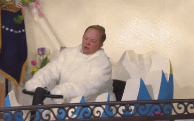 Woman In White Jacket Riding Roller Coaster GIF