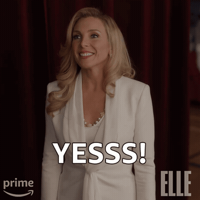 Woman In White Jacket Says Yesss GIF