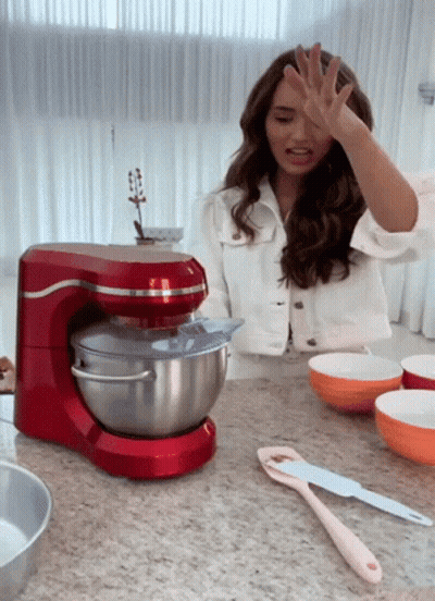Woman In White Jacket With Red Stand Mixer GIF