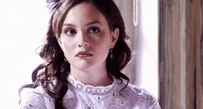 Woman In White Lace Dress And Earrings GIF
