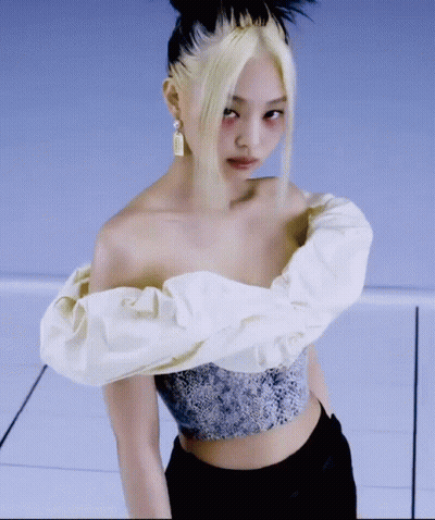 Woman In White Off-Shoulder Top And Black Pants GIF