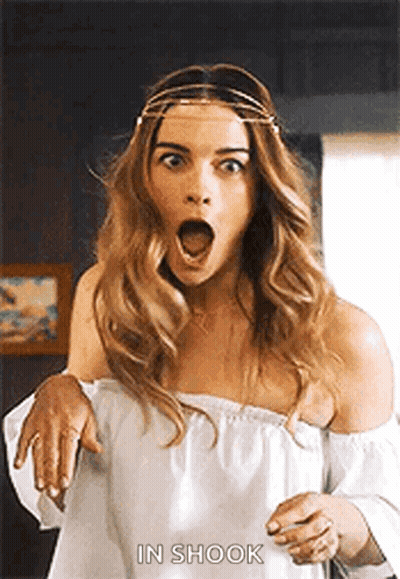 Woman In White Off Shoulder Top Shocked GIF