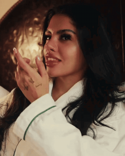 Woman In White Robe With I Love You Tattoo GIF