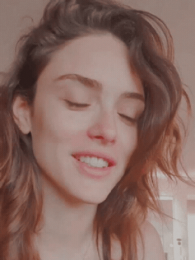 Woman In White Robe With Red Lipstick GIF