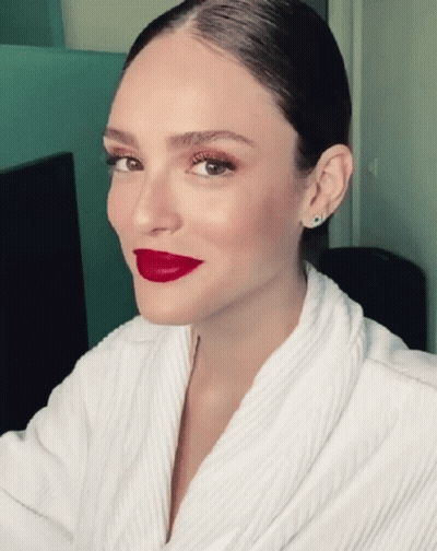 Woman In White Robe With Red Lipstick GIF