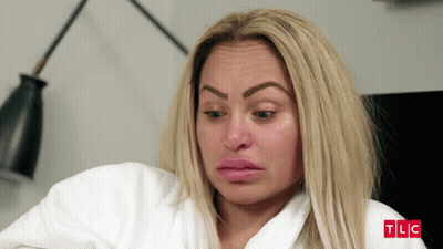 Woman In White Robe With TLC GIF