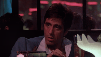 Woman In White Rubbing Forehead GIF