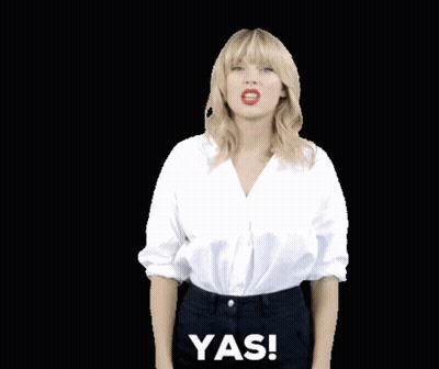 Woman In White Shirt And Black Pants Saying Yas GIF