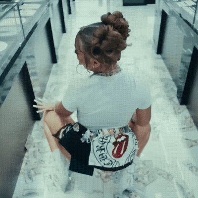 Woman In White Shirt And Black Shorts With Rolling Stones Logo GIF