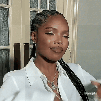 Woman In White Shirt And Hoop Earrings GIF