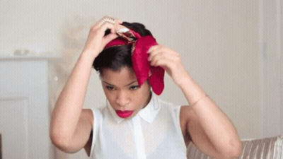 Woman In White Shirt And Red Head Scarf GIF