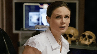 Woman In White Shirt At Computer GIF