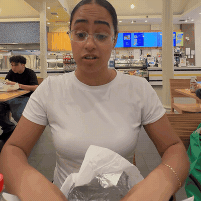 Woman In White Shirt At Ice Cream Menu GIF
