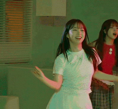 Woman In White Shirt Dancing With Another Woman GIF