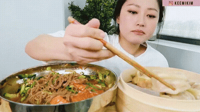 Woman In White Shirt Eating Noodles With Chopsticks Keemikim GIF