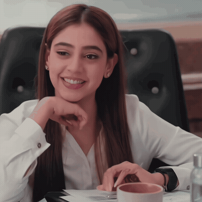 Woman In White Shirt Hand On Chin GIF