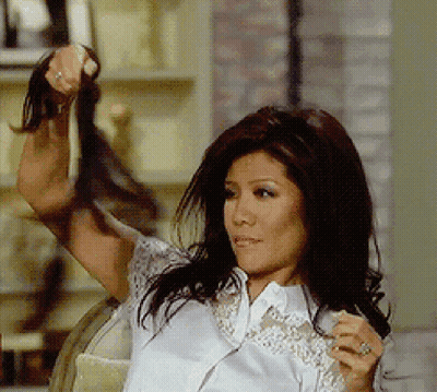 Woman In White Shirt Holding Hair GIF